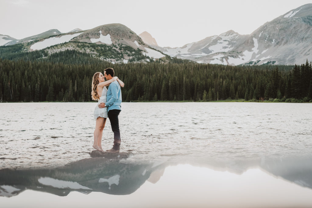 Brainard Lake outdoor lake mountain adventurous fun candid loving engagement picture | From the Hip Photo Denver Colorado portrait photography 