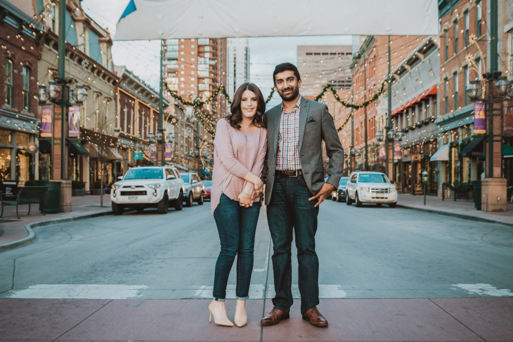 Downtown Denver Dairy Block outdoor urban fun candid loving engagement picture | From the Hip Photo Denver portrait photography 