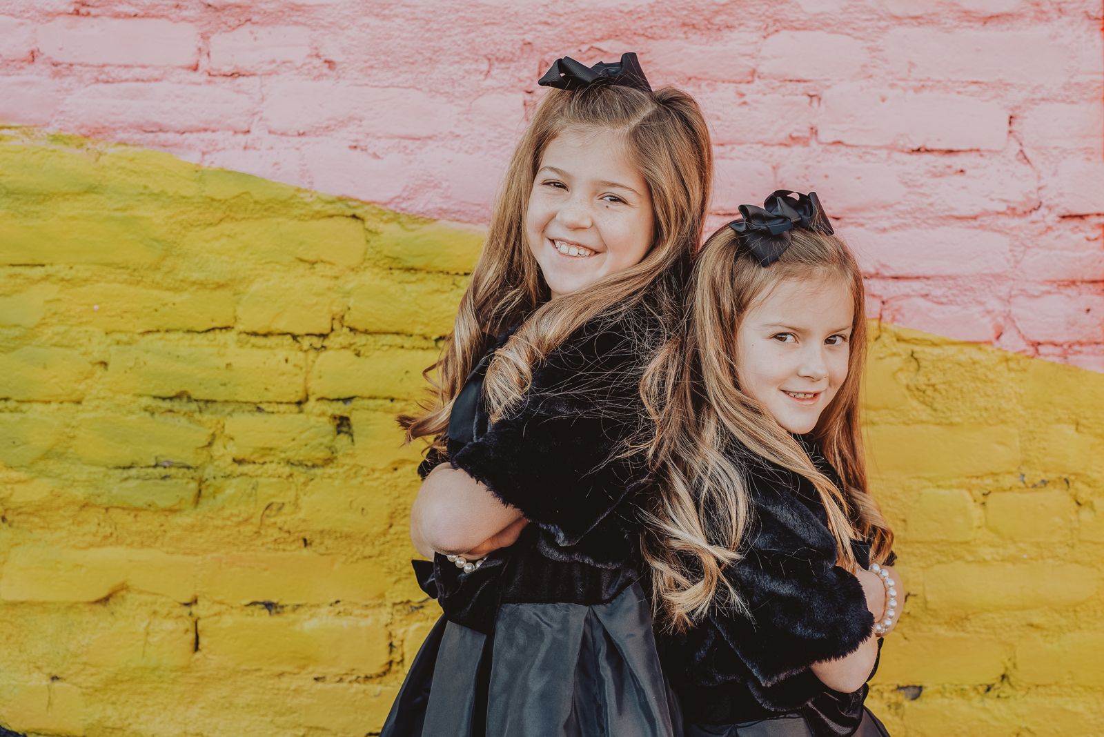 Golden hour photo session in RiNo Art District Denver with warm light on murals