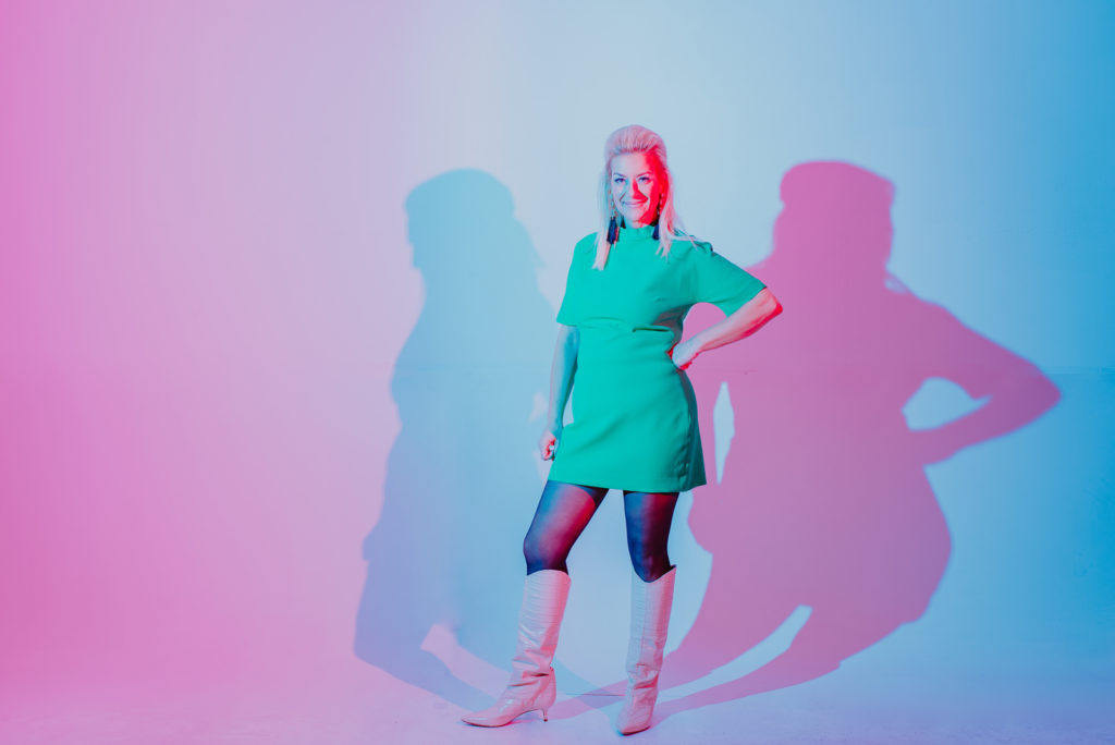 Business Photography | Spy Bar Owner poses against neon blue and pink background | Portrait Photography | Factory Five Five