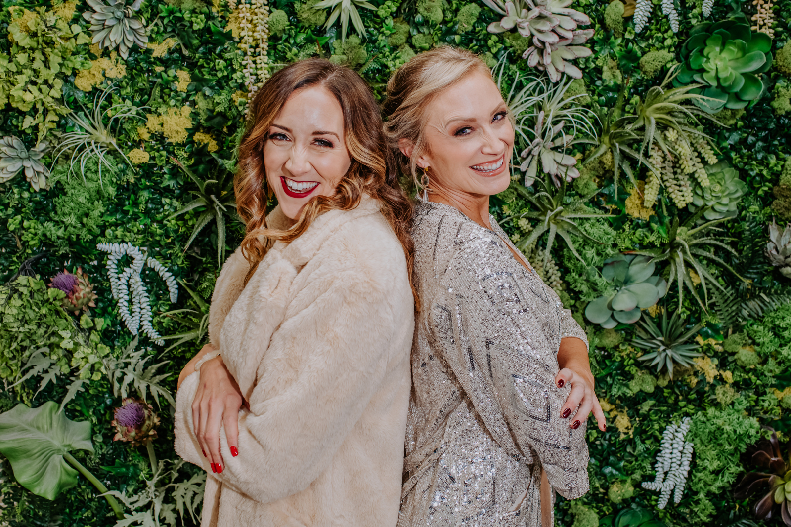Fashion Portraits | Two models pose back-to-back in front of plants | Denver, Colorado