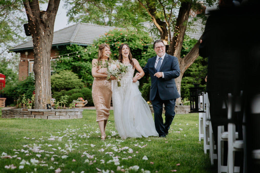 From the Hip Photo captures wedding photos at Lionsgate and has some fun in the rain. 