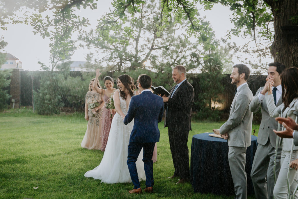From the Hip Photo captures wedding photos at Lionsgate and has some fun in the rain. 