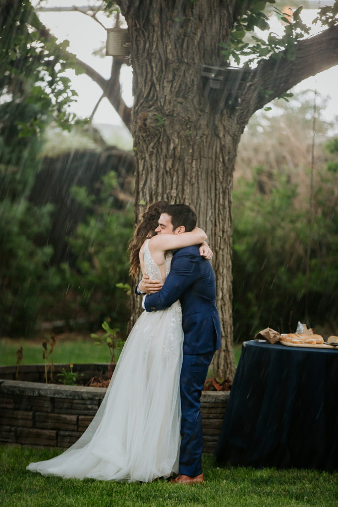 From the Hip Photo captures wedding photos at Lionsgate and has some fun in the rain. 