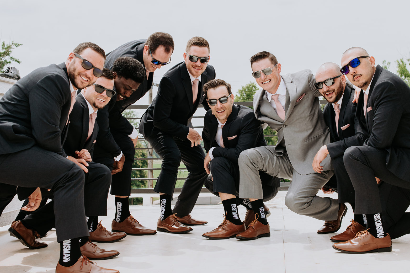 Wedding photos | Groom and groomsmen pose together | Denver Botanical Gardens 