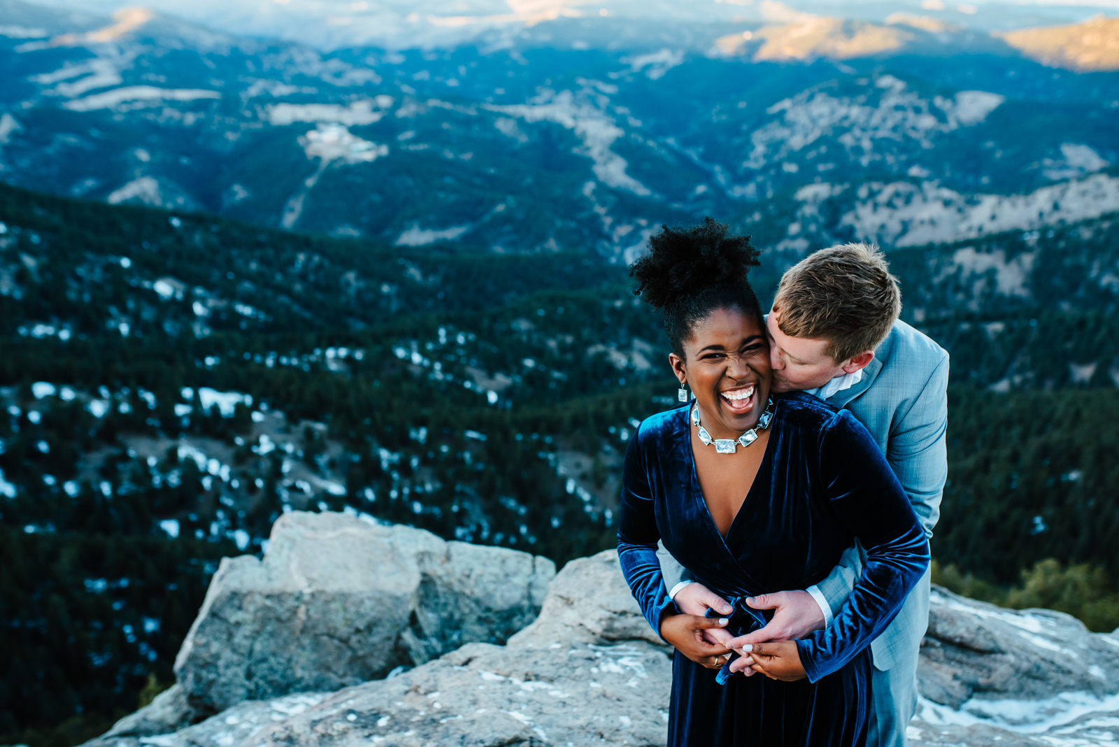 Engagement photography at Lost Gulch Overlook Colorado with dramatic mountain backdrop