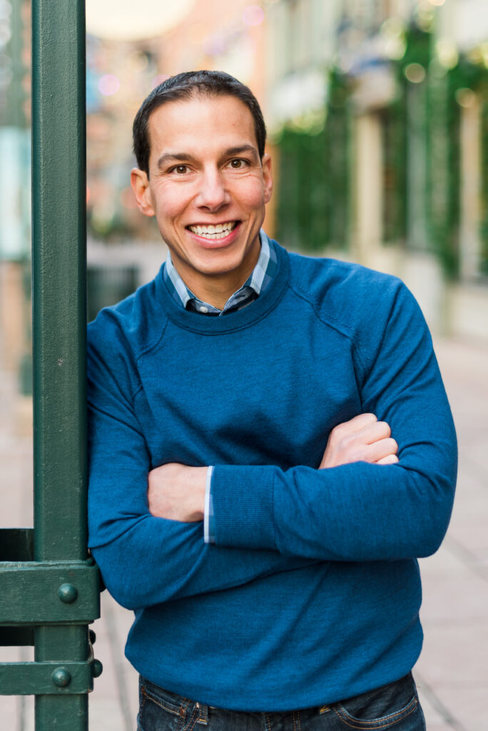 Photographer directing client during Denver headshot session