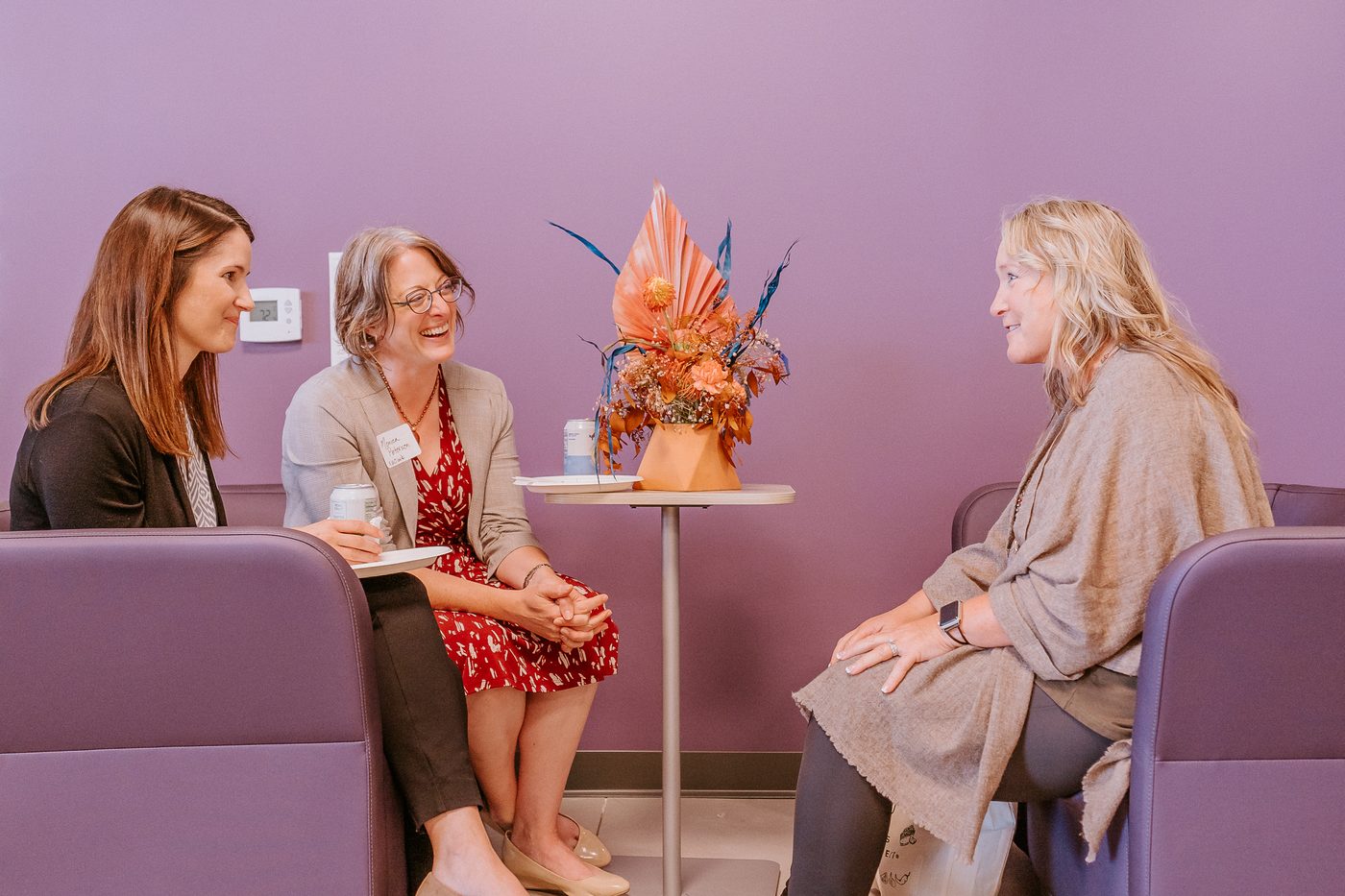 Behind the scenes of Denver event photography showing photographer at work during live event