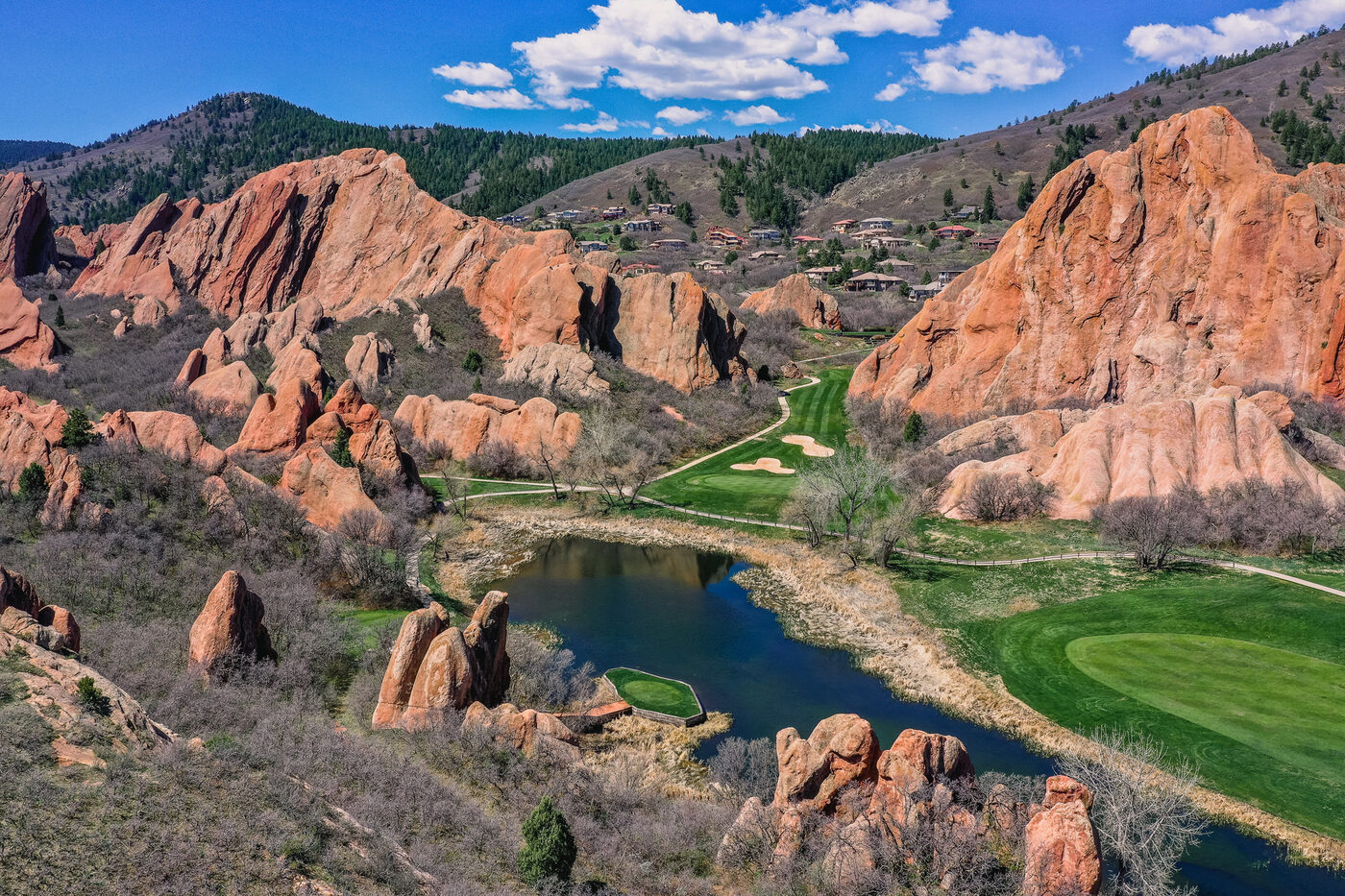 Aerial view of the red rock formations and fairway at Arrowhead Golf Club, Littleton